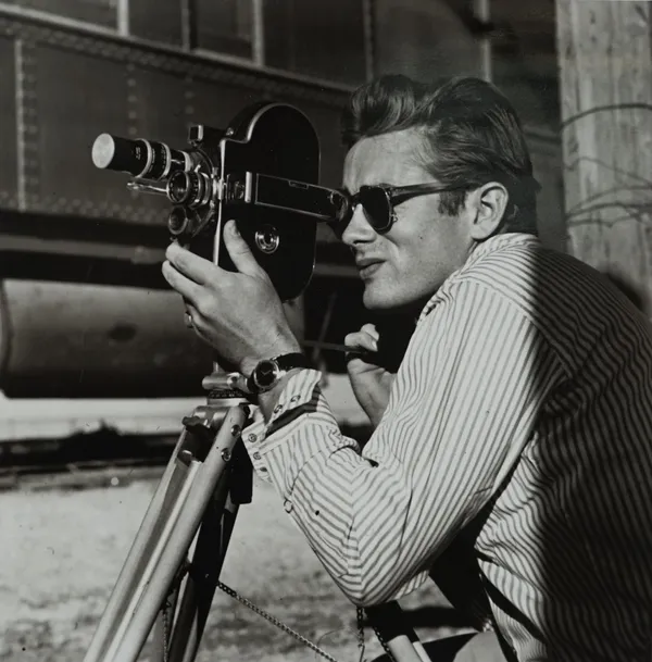 SID AVERY (1918 - 2002)  JAMES DEAN:  a giclee black and white portrait print of James Dean with a Bolex camera on the Marfa, Texas set of the film 'G
