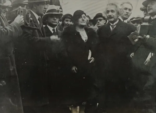 ALBERT EINSTEIN / ENRICO FERMI and OTHERS;  'Einstein Besieged by Interviewers', 1930, black and white Chicago Bureau Tribune Tower press photograph,