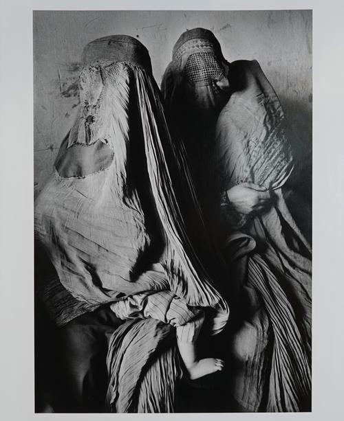 SEBASTIAO SALGADO  (b. 1944)   Afghanistan, 1996,  from the series Exodus, published 1990, gelatin silver print, signed, titled and dated in pencil by