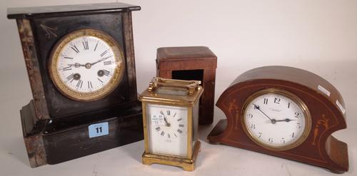 Asprey a leather cased gilt brass carriage timepiece, an Edwardian mahogany eight day timepiece and a slate case clock, (3).