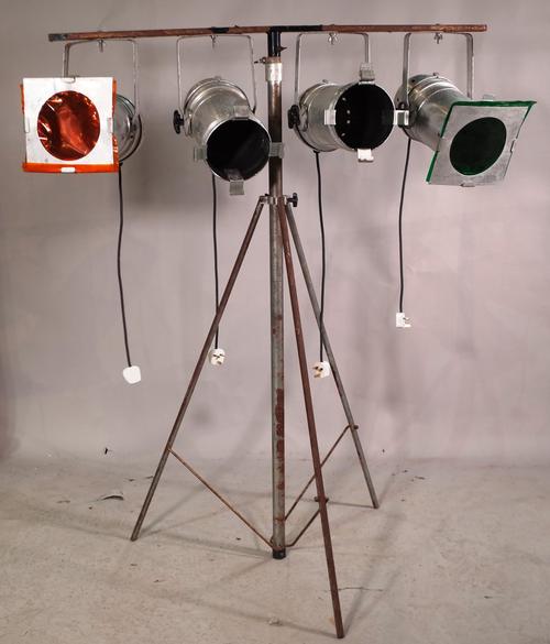 A 20th century four branch aluminium studio light on tripod base, 185cm tall.