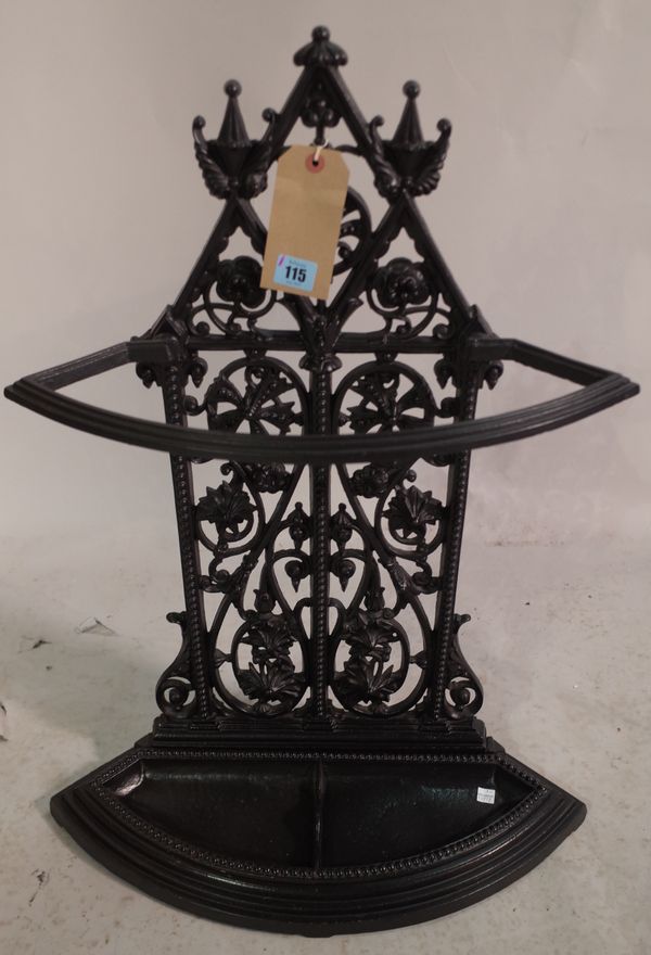 A Victorian style black painted cast iron umbrella stand, 48cm wide x 76cm high.