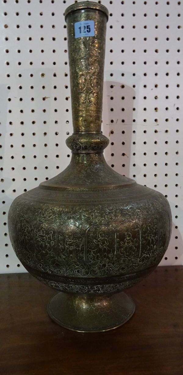 A large engraved brass bottle vase, probably Sri Lankan, 19th century, the body engraved with lappet shaped panels enclosing figures and animals again