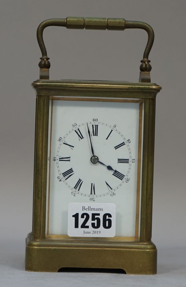 A French brass cased carriage clock, late 19th century, with visible platform escapement, single train movement and enamel dial, 12cm high, (key).