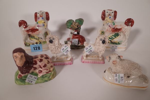 A group of small 19th and 20th century Staffordshire figures, including Dogs, sheep and lions, (qty).