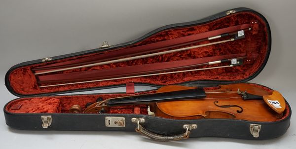 A violin, interior label reads 'Joseph Ceruti Filius Baptiste Fecit ad Imitatonem Straduvari Cremone 1806', back measures 14 inches, with two bows and