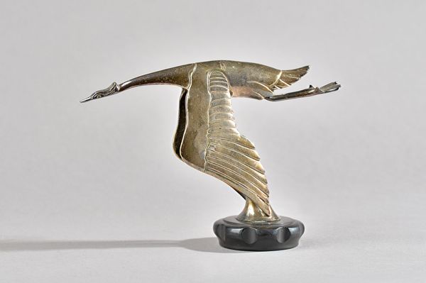 A Hispano Suiza silver plated flying stork, car mascot, circa. 1923, 14.5cm high.  Illustrated