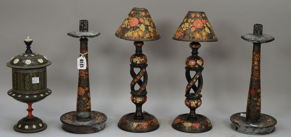 A pair of Kashmiri candlesticks, foliate painted decoration with hexagonal sconces and matched shades, 30.5cm high, a later pair with barley twist ste