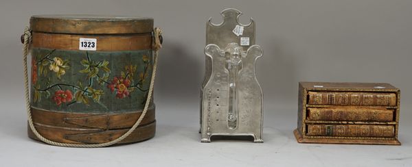 A Shaker bentwood box and cover, 19th century with foliate painted decoration, 24cm high, a pewter and glass table top barometer, 26.5cm high and a sm