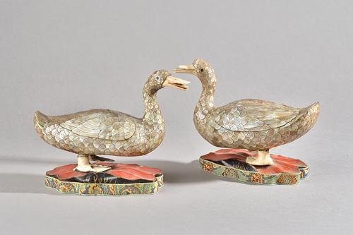 A pair of 19th century Chinese mother-of-pearl and ivory duck form box and covers, each with a small disguised cover inscribed "Qianlong yu wan", the