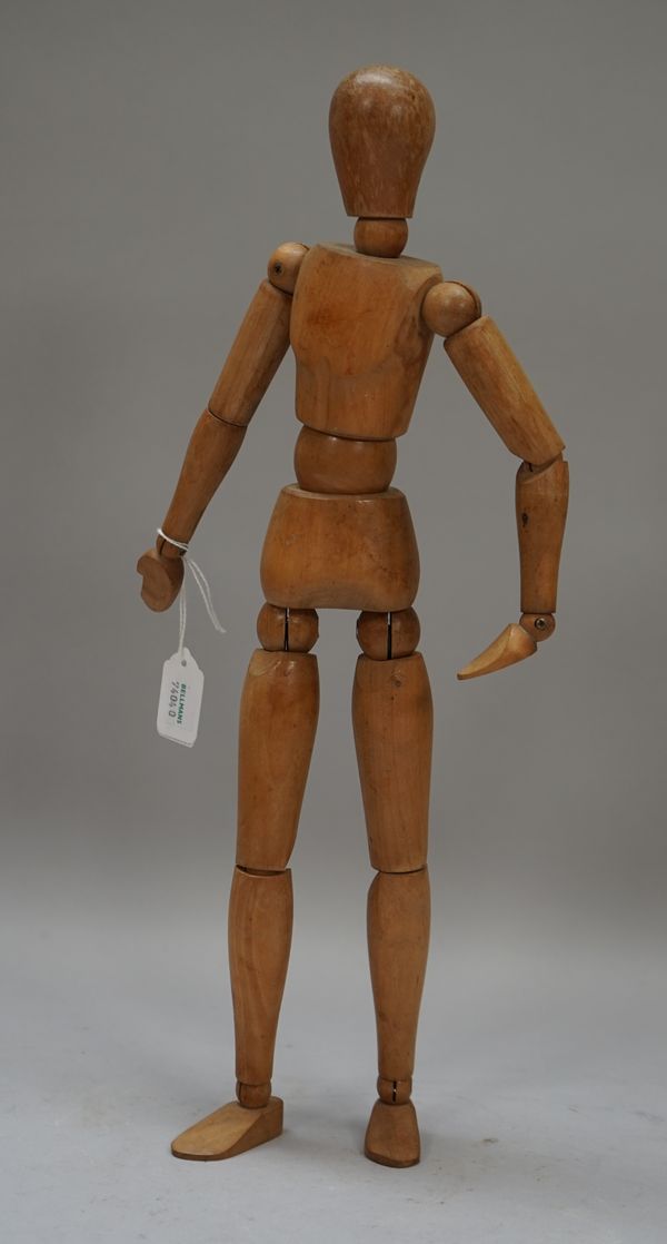 A mid-20th century artist's beech lay figure with articulated joints, 41cm.