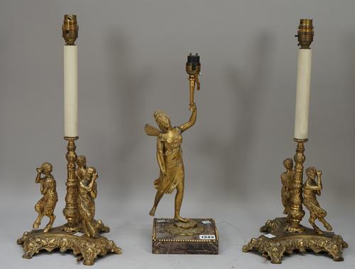 A late 19th/early 20th century ormolu lamp with breche niolette marble square base, 30cm high and a pair of gilt metal lamps, the bases with three sat