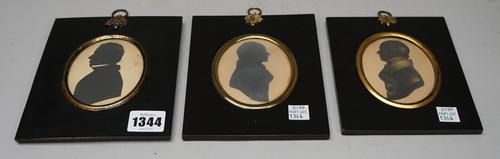 A group of three early 19th century silhouette portraits, depicting William Wootton MRCS, LSA (1802-1866), 8.5cm, and two of his sons, probably Willia