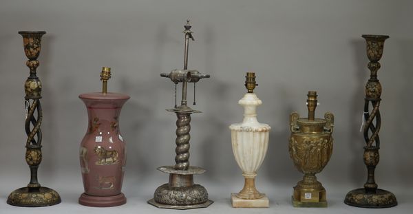 A pair of Kashmiri foliate painted wooden candlesticks with open barley twist stems, 51cm high, a silver plated candlestick table lamp embossed with f