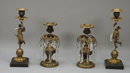 After Giambologna; A pair of 19th century French bronze and gilt candlesticks of Mercury and Fortuna and a pair of George IV bronzed and ormolu vase s