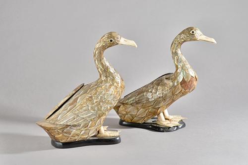 A pair of 19th century Chinese mother-of-pearl and ivory standing duck-form box and covers, each with mother-of-pearl veneered body delicately incised