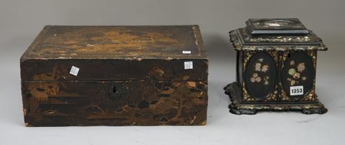 A Victorian papier-mâché table top jewellery cabinet, the hinged lid and doors opening to reveal a fitted interior, foliate inlaid with mother-of-pear