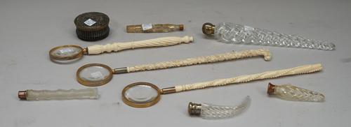 An early 19th century tortoiseshell snuff box, the circular basket weave carved body with applied silver foliate decoration to the lid (7cm diam), a l