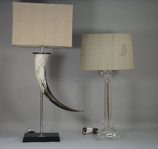 A modern Perspex table lamp of column form on a square foot and one further modern faux horn table lamp, both with shade, the latter 95cm high overall