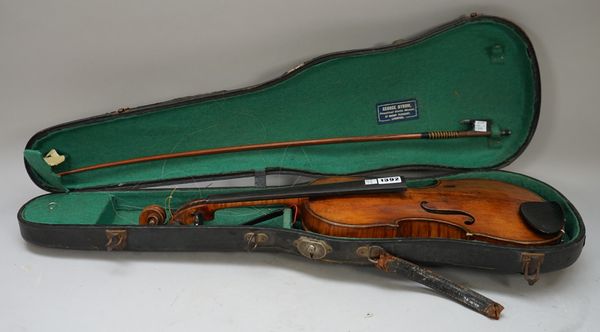 A violin, interior paper label detailed 'Andreas Guarnerius Cremonae Fuo Inado (?) Sanctae Terefine 1676', length of back 14 inches, with bow and hard