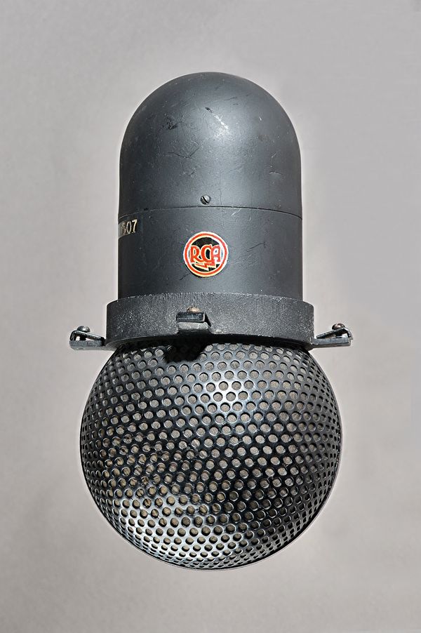 An RCA Cardioid ribbon 'skunk' microphone, Type KU2A, c. 1944, with metal suspension bracket. Illustrated Provenance: Property of the Late Ray Merrin,