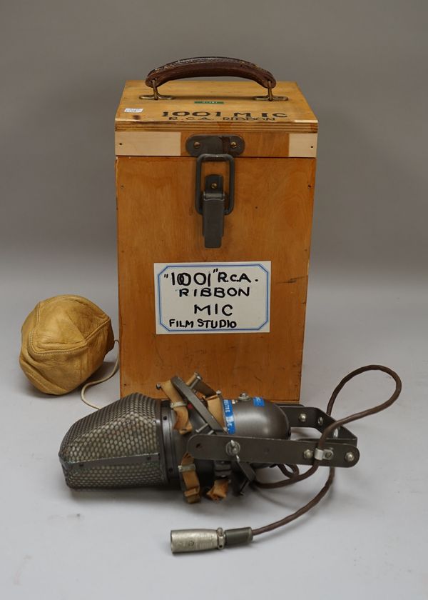 An RCA Uni-directional type KU-3A ribbon microphone, pre-war, with metal bracket & case.    Provenance: Property of the Late Ray Merrin, film re-recor