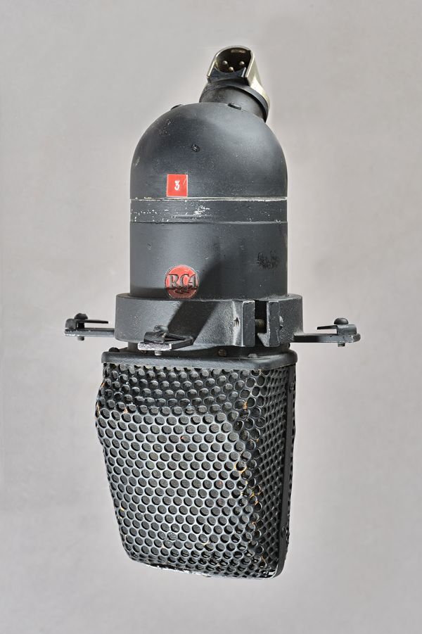 An RCA Uni-directional type KU-3A ribbon microphone, pre-war, with metal bracket.Illustrated Provenance: Property of the Late Ray Merrin, film re-reco