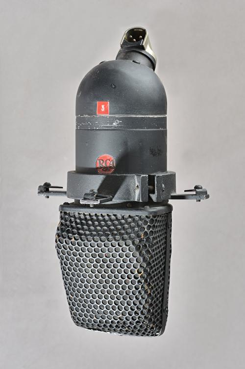 An RCA Uni-directional type KU-3A ribbon microphone, pre-war, with metal bracket.Illustrated Provenance: Property of the Late Ray Merrin, film re-reco