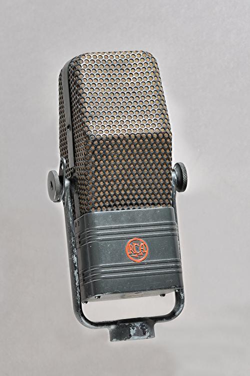 An RCA Type 44-BX, Velocity microphone, c. 1938, with metal stand bracket.Illustrated Provenance: Property of the Late Ray Merrin, film re-recording s