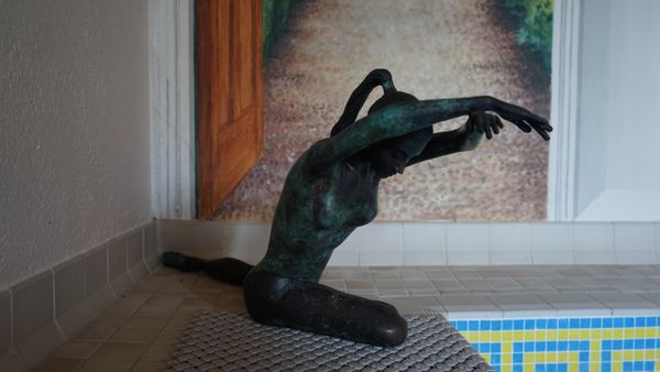 Jonathan Wylder (b. 1957), Ballet dancer, bronze with part green patination, 32cm high. DDS