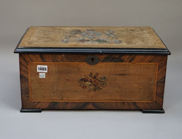 A Swiss walnut cased music box, with 6.5 inch cylinder and enamelled brass butterflies chiming on three bells, 47.5cm wide.