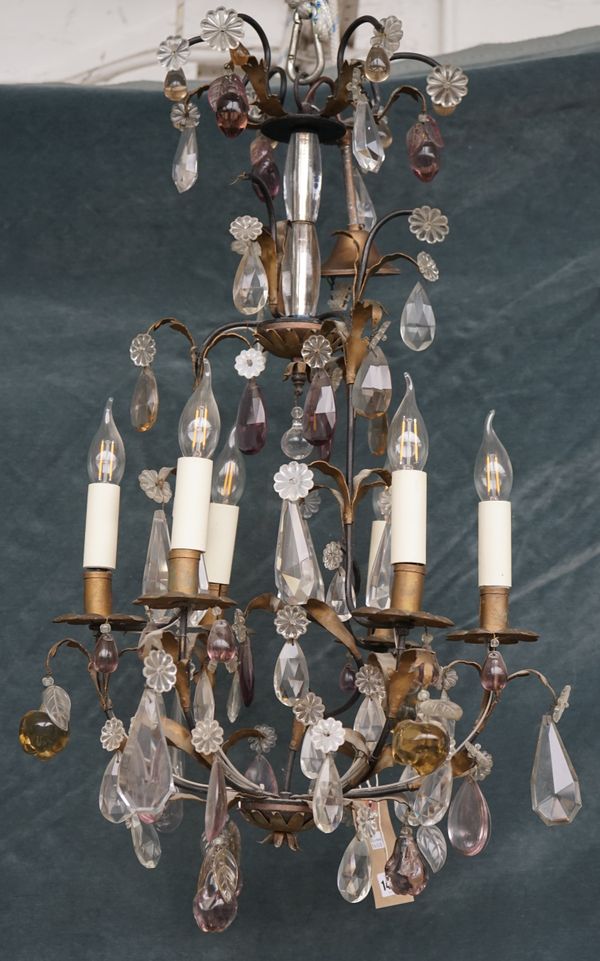 A modern six branch gilt metal and glass chandelier of open form with foliate moulded glass leaves and coloured drops, 78cm high.