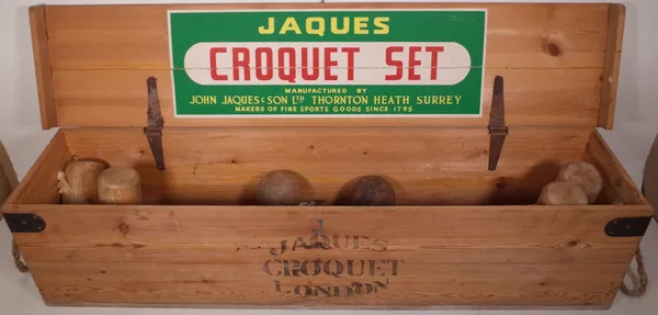 A 20th century Jacques croquet set, within a pine box.