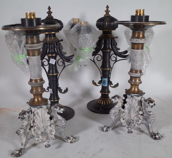 A pair of 20th century Regency style twin branch table lamps with etched glass shades, 39cm high and two further lamps with lion formed bases, 35cm hi