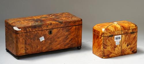 A George III blonde tortoiseshell dome top rectangular tea caddy with twin lidded interior, 18cm wide x 14cm high and a similar larger, 30cm wide x 14