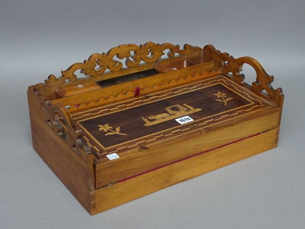 A 19th century Anglo-Indian inlaid hardwood writing slope with fret carved decoration, 46cm wide x 20cm high.