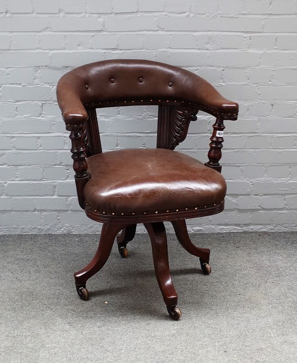 A Victorian mahogany framed tub back office swivel chair, on four downswept supports, 66cm wide x 87cm high.