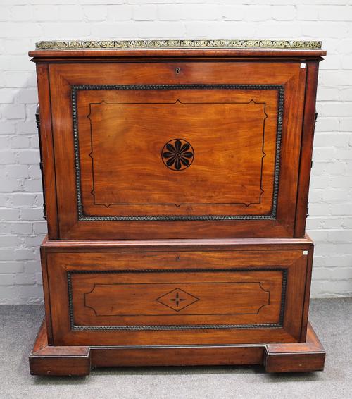 A George IV ebony inlaid mahogany folio cabinet, the pierced brass galleried top over fall front and matching opposing, revealing a shelf interior, th