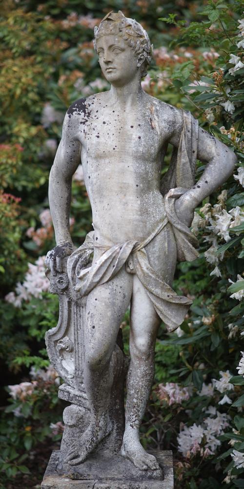 A marble figure of Apollo after The Antique, 20th century, on square base, 140cms high.  Illustrated