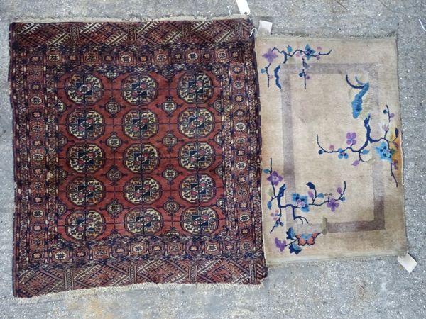 A Chinese rug and a Tekke Turkman rug, 106cm x 91cm, (2).