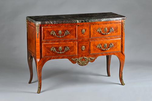 A Louis XV style commode, the marble top over a gilt metal mounted kingwood base with two short and one long drawer on cabriole supports, 112cm wide x