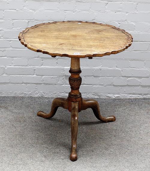 A George III mahogany tripod occasional table, with pie crust snap top on spiral fluted column, 70cm diameter x 70cm high.