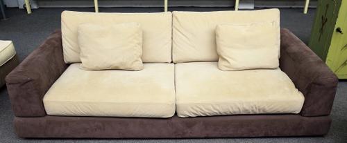 Natuzzi; a 20th century square back sofa in brown suede upholstery, 223cm wide x 65cm high.