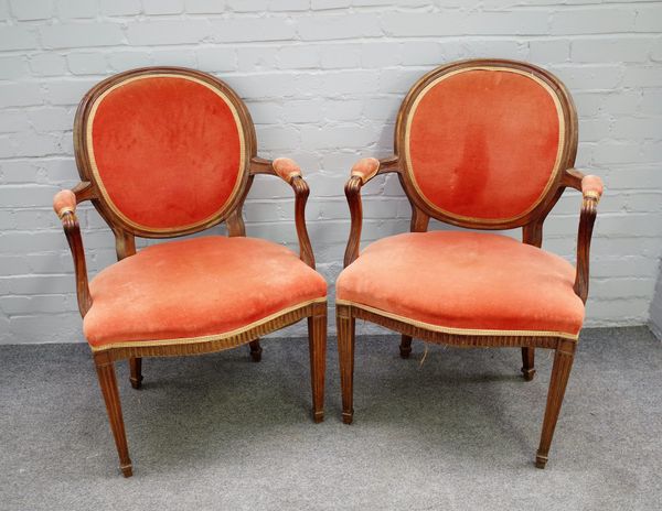 A pair of George III style beech framed open armchairs, on channelled tapering square supports, 62cm wide x 94cm high (2)  64