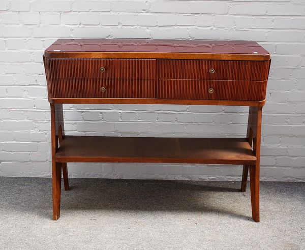 Osvaldo Borsani, (Italian, 1911-1985), a walnut side table with red glass top and concave front, 119cm wide x 100cm high.