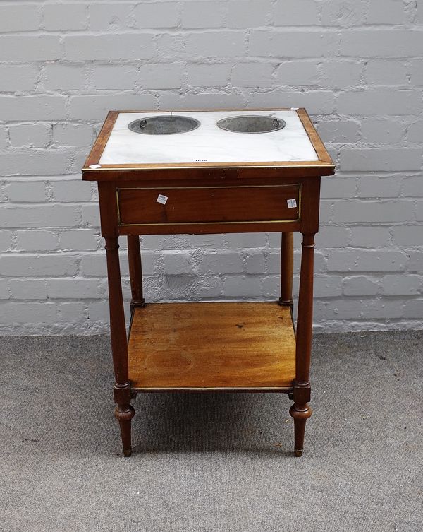 A late 18th century Directoire brass-mounted mahogany "Table de Raffraischoir", the inset Carrara marble top with two brass cylindrical wine coolers,