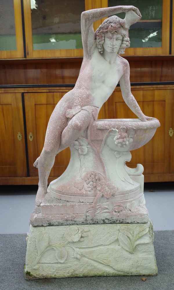 A reconstituted water fountain in the form of a lady bathing at a pool, on a floral moulded plinth base, 65cm wide x 102cm high.