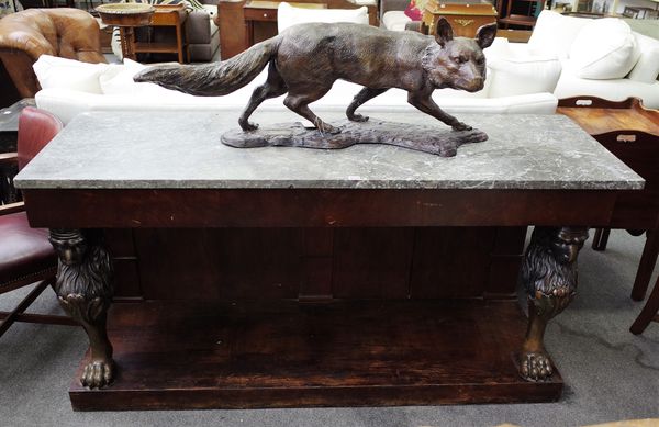 A 19th century and later console, the rectangular marble top on pair of lion monopodia supports, united by undertier, 177cm wide x 85cm high.