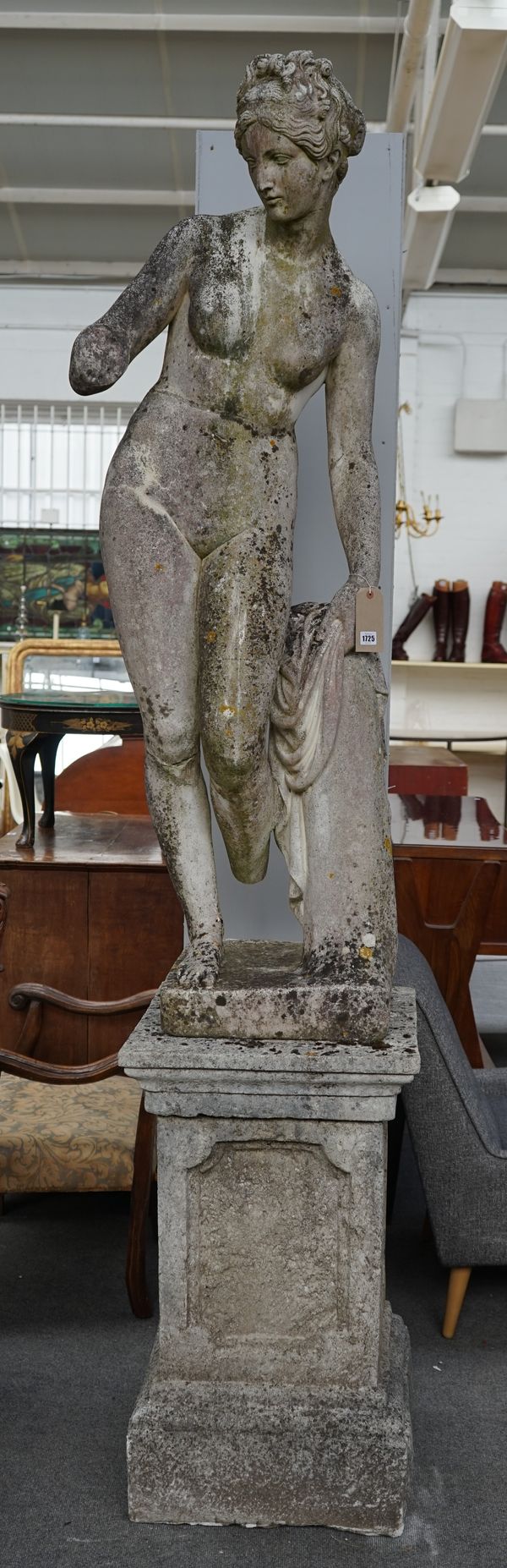 A reconstituted figure of a bathing lady on stepped square pedestal, 245cm high.