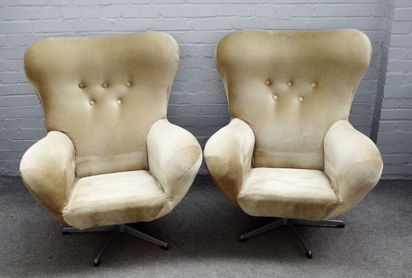 UP Zavody Rousinov; a pair of mid-20th century egg chairs, each on stamped five point base, 85cm wide x 100cm high. (2)